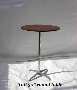 Tall, thirty inch diameter round wooden table