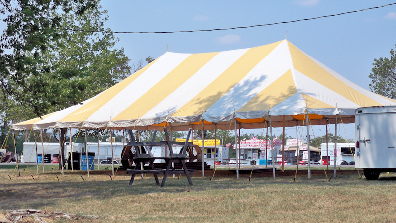 Yellow striped tent canopy.