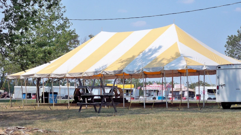 Yellow striped tent canopy.